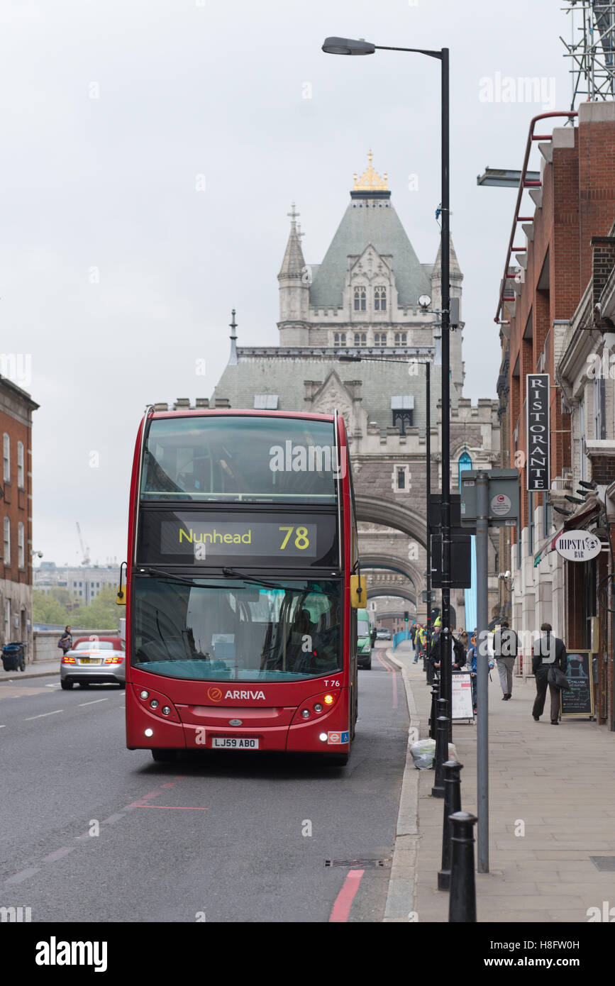 England, London, bus in front of the Tower Bridge. Stock Photo