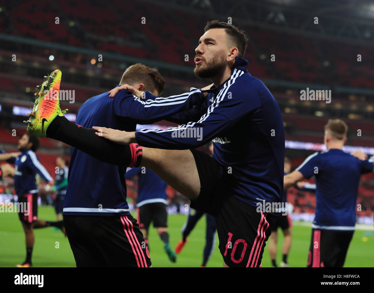 Scotland's Robert Snodgrass warms up before the 2018 FIFA World Cup qualifying, Group F match at Wembley Stadium, London. Stock Photo