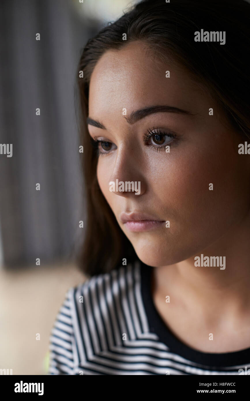 Head And Shoulders Portrait Of Serious Teenage Girl Stock Photo - Alamy