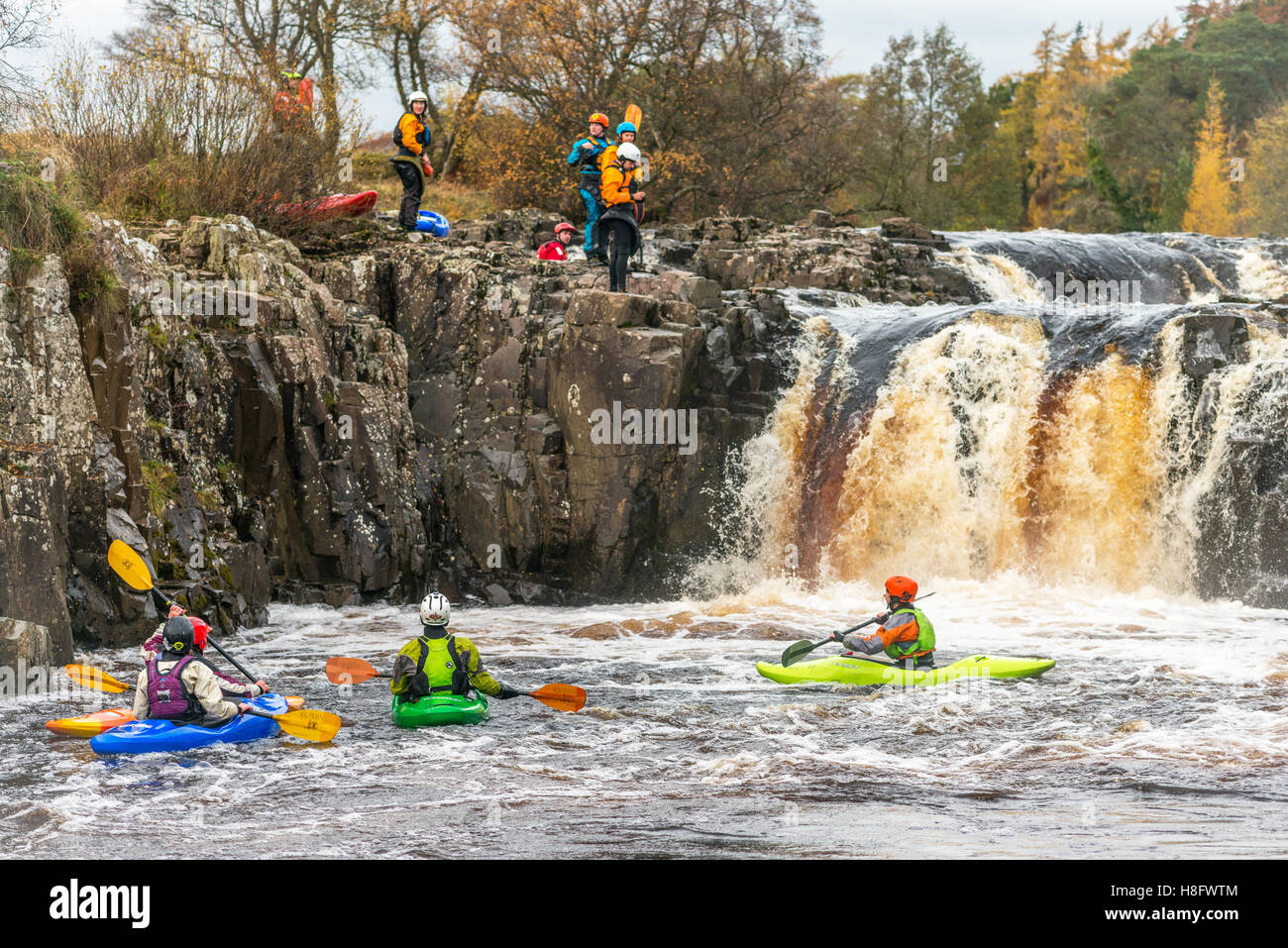 students learn to kayak on the river Tees at Low Force waterfall in Upper Teesdale Stock Photo