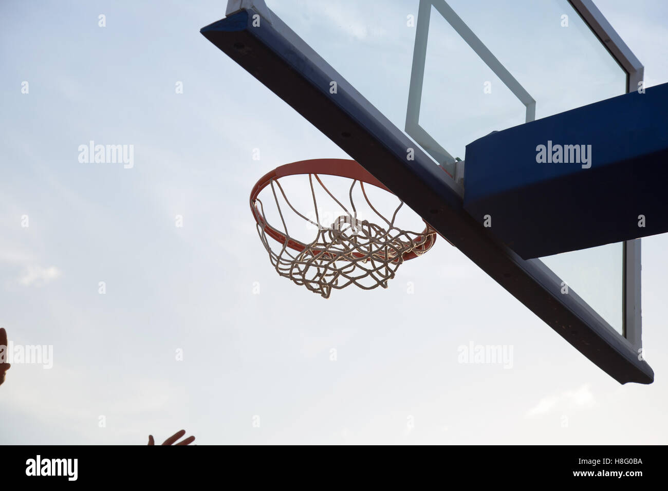 Basketball going through net hi-res stock photography and images - Alamy
