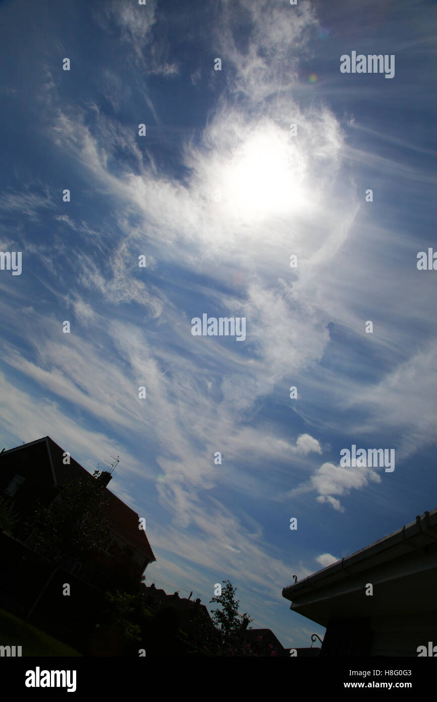 what shape can you see in these clouds looks like superman or an angle ...