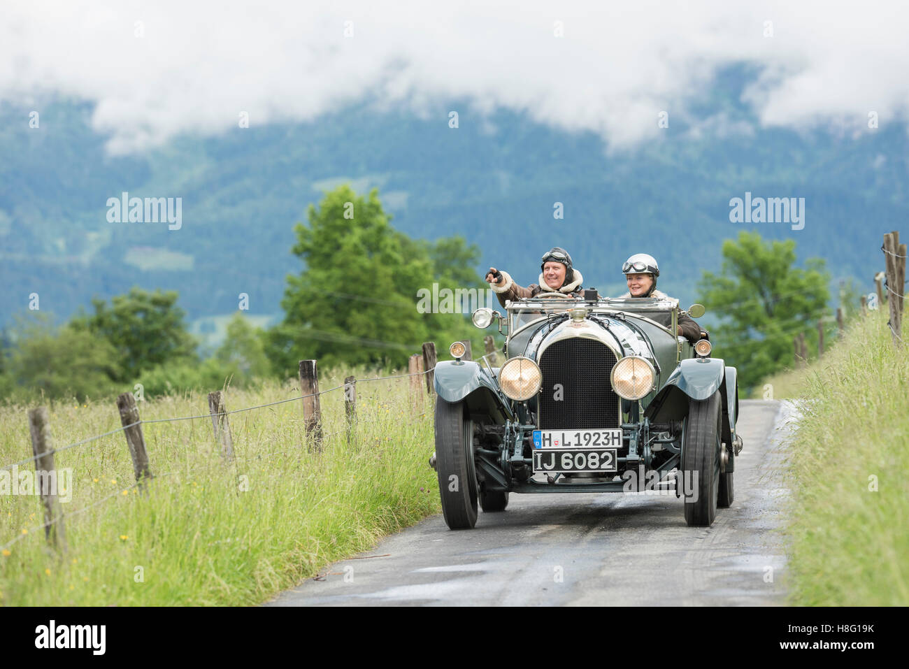 Couple in the classic car Stock Photo - Alamy