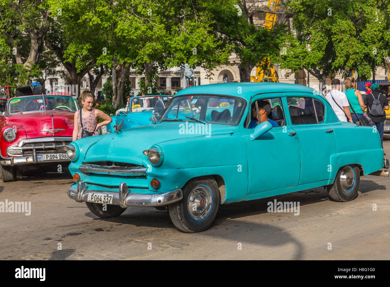 classic car taxis on the streets of Havana, Havana, La Habana, Cuba, the Republic of Cuba the Greater Antilles, the Caribbean Stock Photo