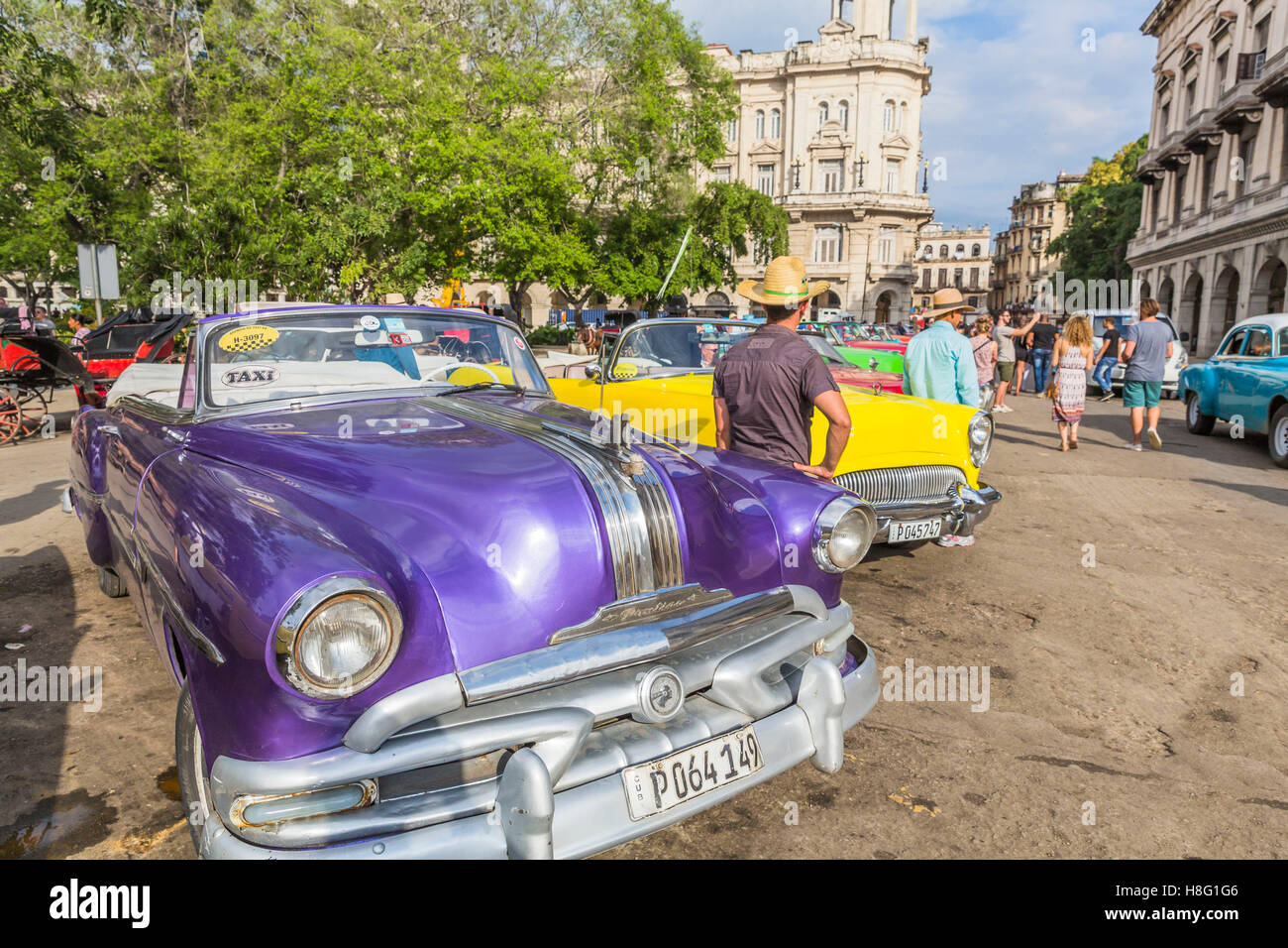 classic car taxis on the streets of Havana, Havana, La Habana, Cuba, the Republic of Cuba, the Greater Antilles, the Caribbean Stock Photo