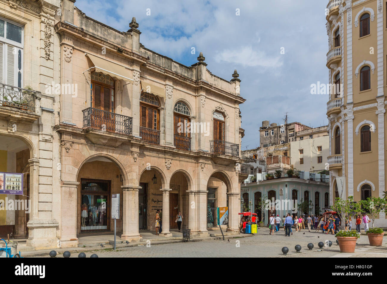Restored colonial building and town palaces in the centre of Havana, behind cafe of Taberna, performance bar of Buena Vista Social Club, Plaza Vieja, Havana, La Habana, Cuba, Republic of Cuba, the Greater Antilles, the Caribbean Stock Photo