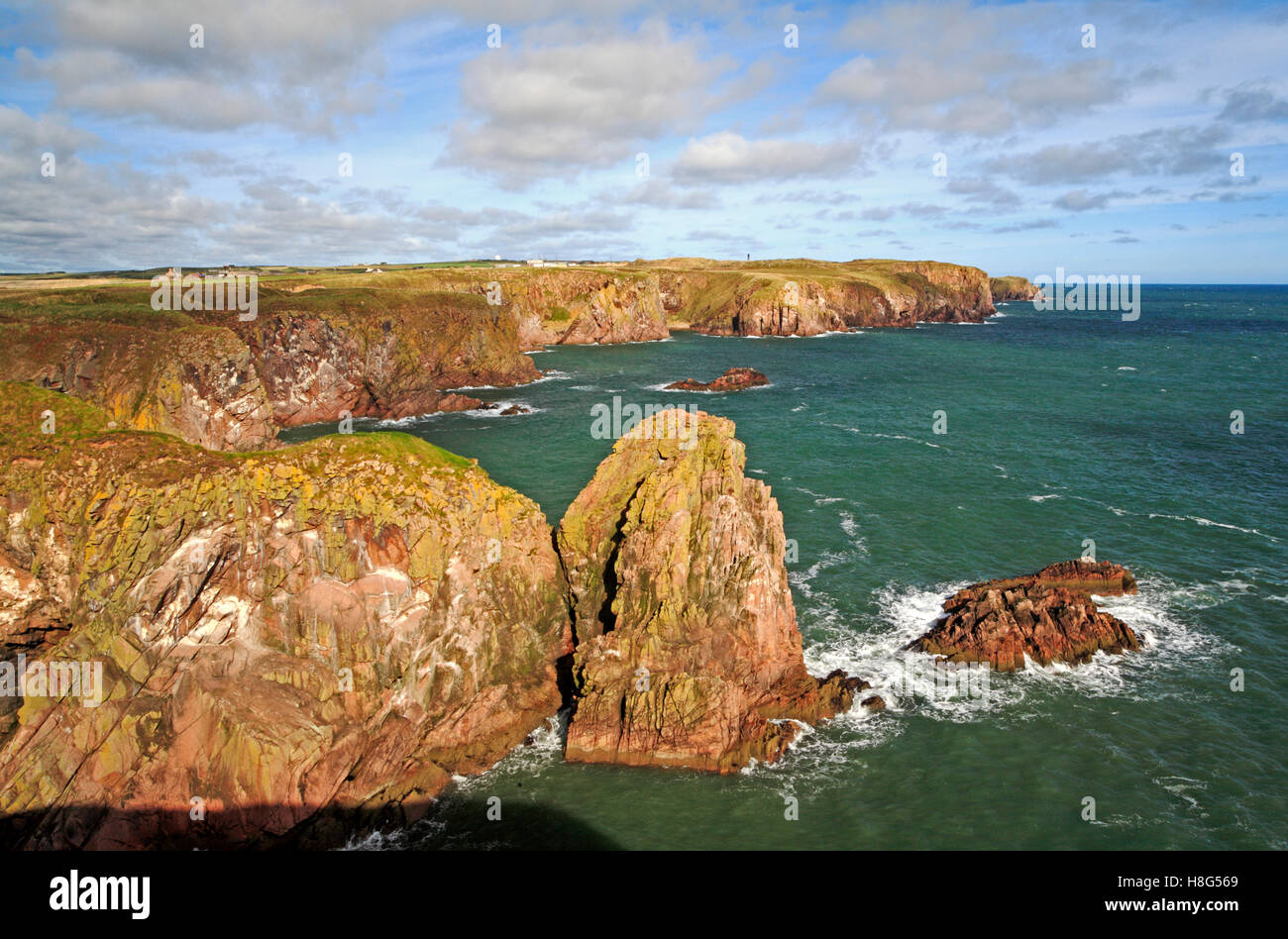 A view of the rocky coastline and coastal features at Bullers of Buchan, Aberdeenshire, Scotland, United kingdom. Stock Photo