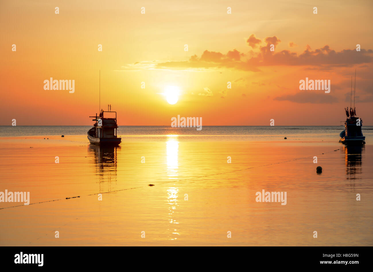Fishing boats sea sunset hi-res stock photography and images - Alamy