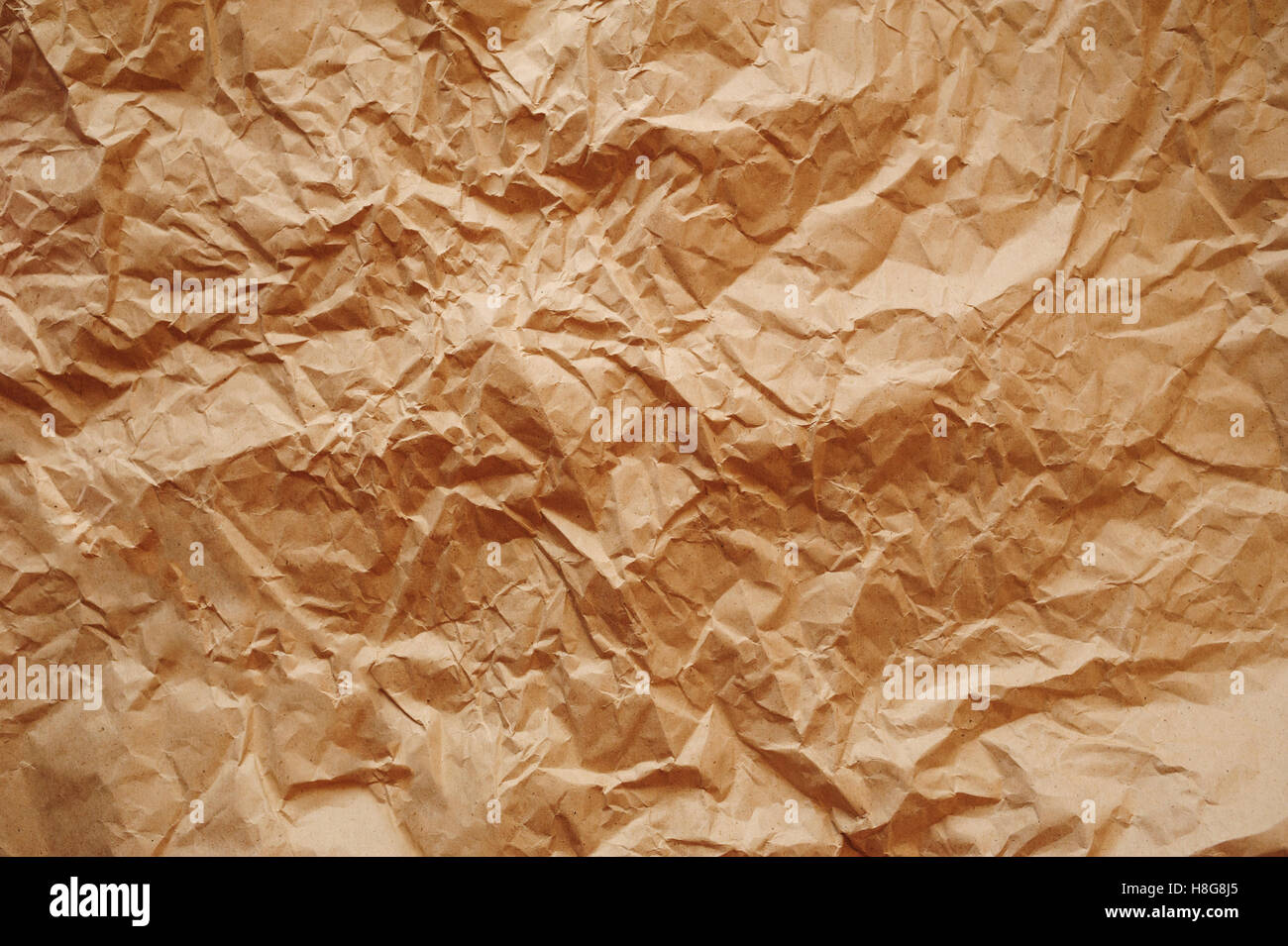 Crumpled brown kraft paper texture Stock Photo by ©stevanovicigor