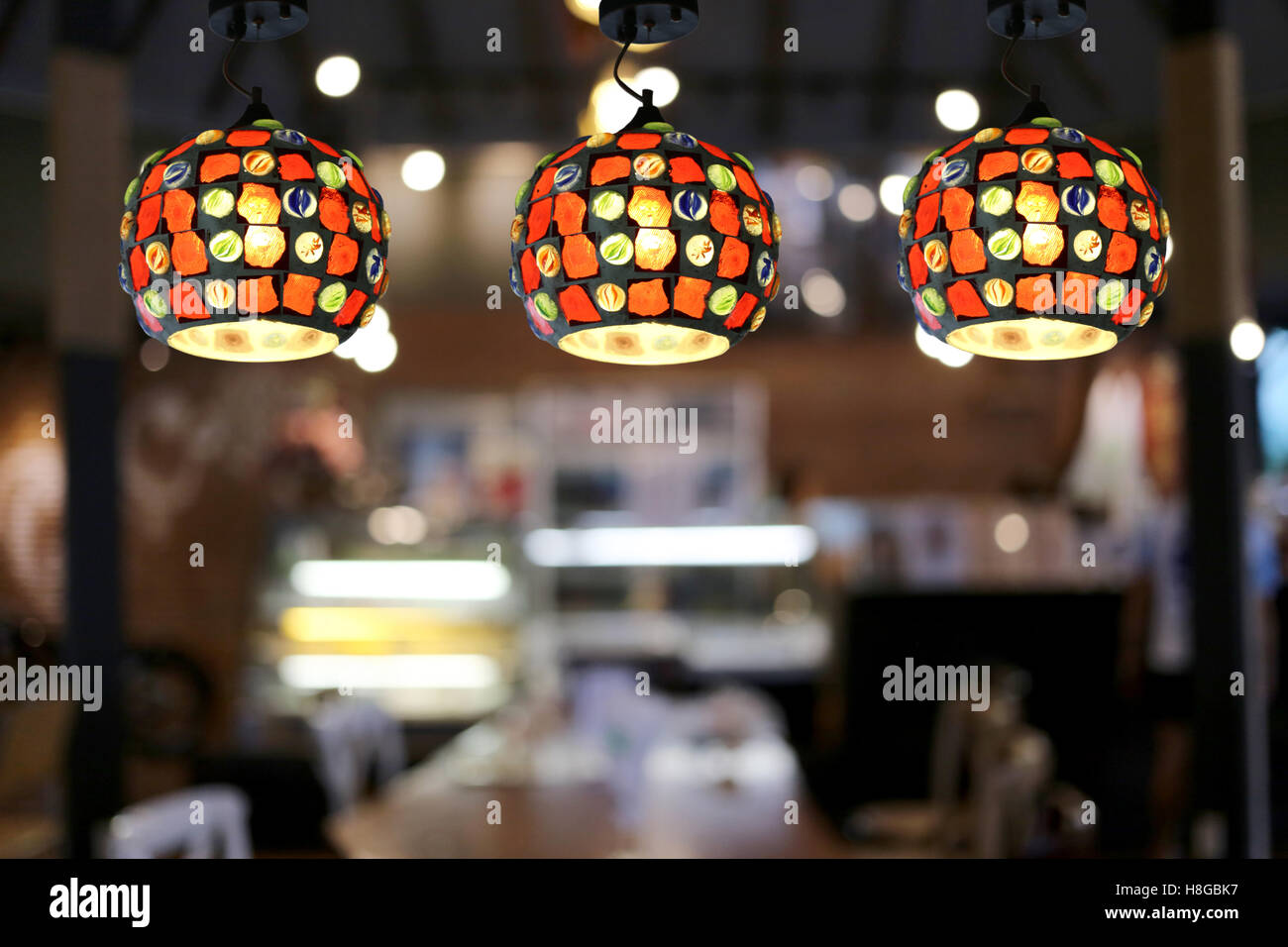Warm lighting modern ceiling lamps in the cafe and interior decoration ...