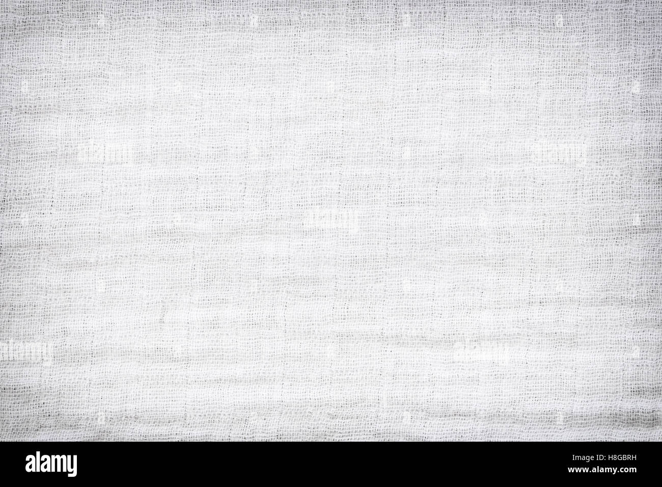 Texture of white raw fabric for the background design,gray fabric texture for backdrop. Stock Photo