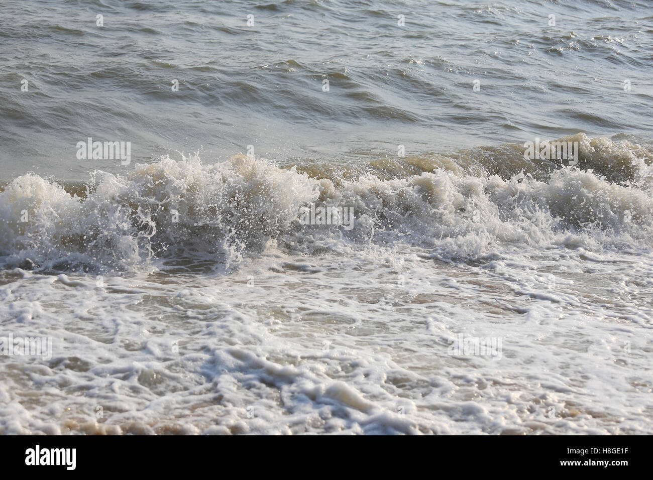 waves that swept on the beach for design nature background. Stock Photo