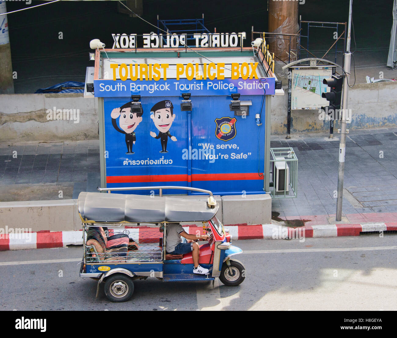 Iconic Bangkok scene, tuk tuk and tourist police box, Bangkok, Thailand Stock Photo