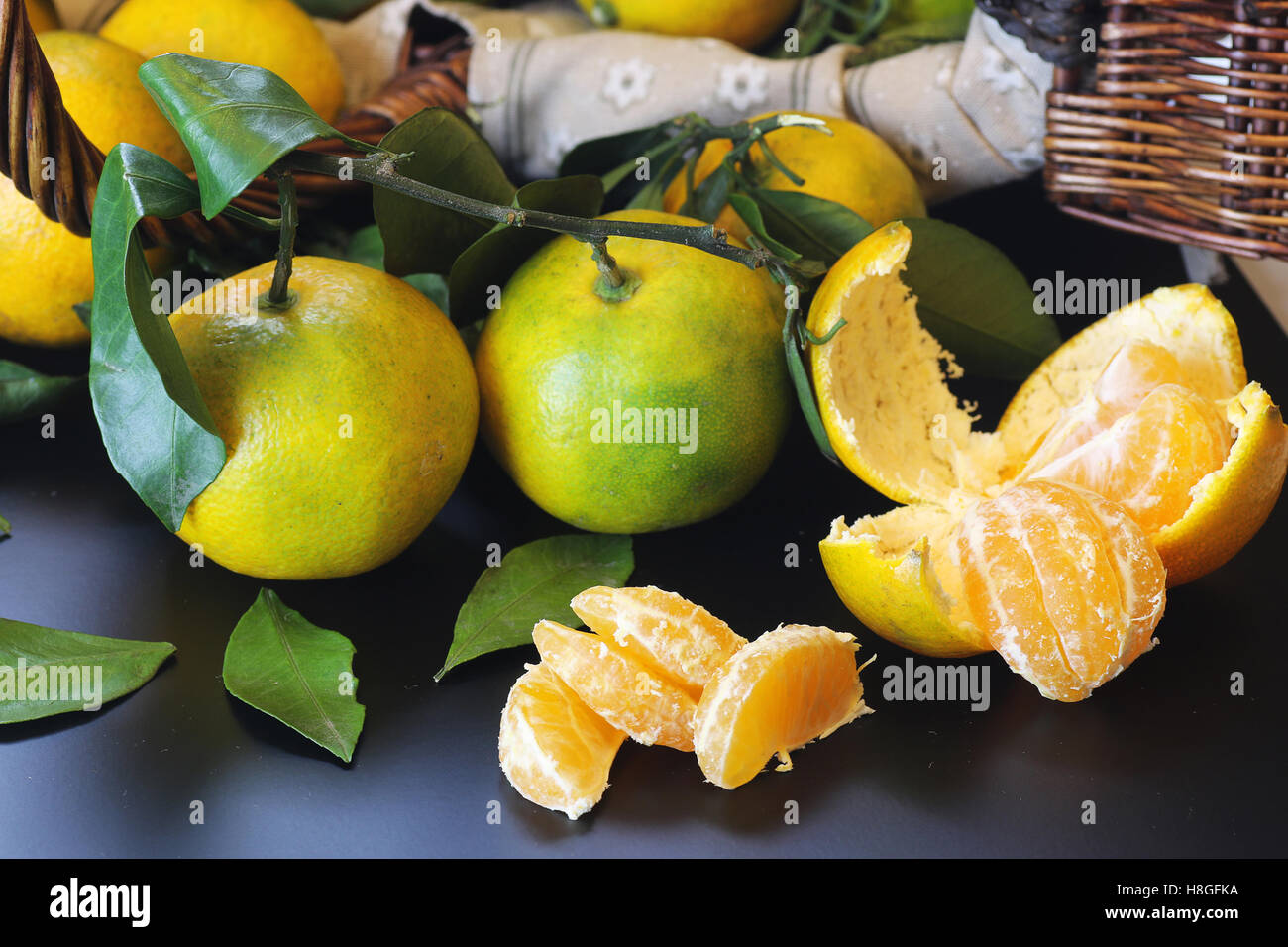 mandarin fruit isolate black Stock Photo Alamy