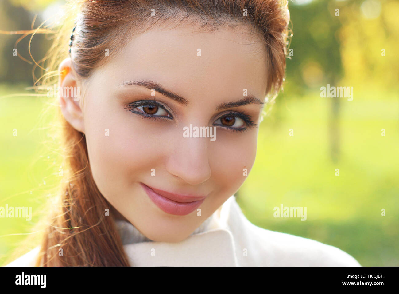 girl walking in the park in autumn Stock Photo Alamy