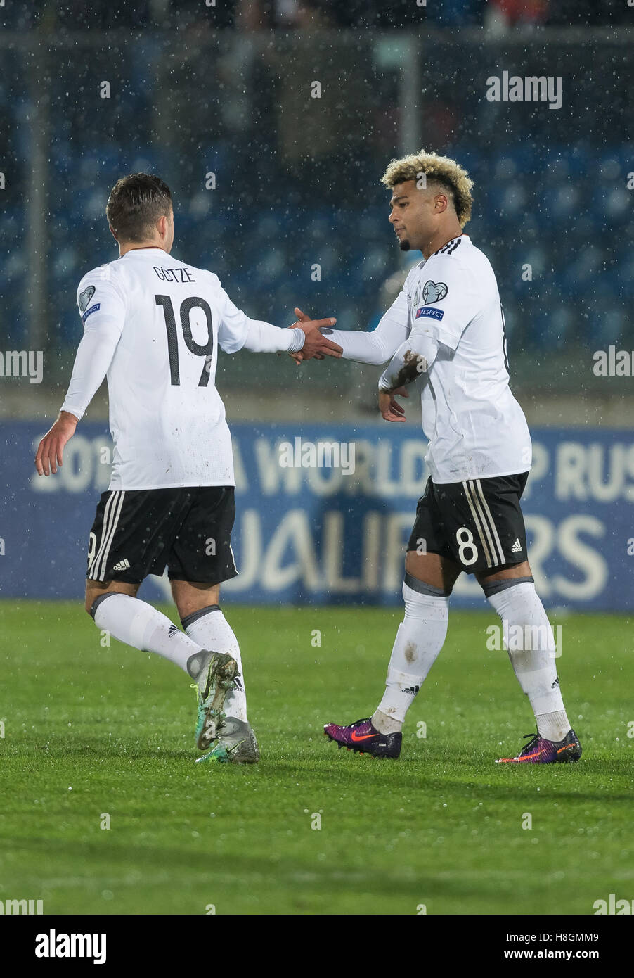 Serravalle, San Marino. 11th Nov, 2016. Germany's Serge Gnabry (R) celebrates his 02 goal with