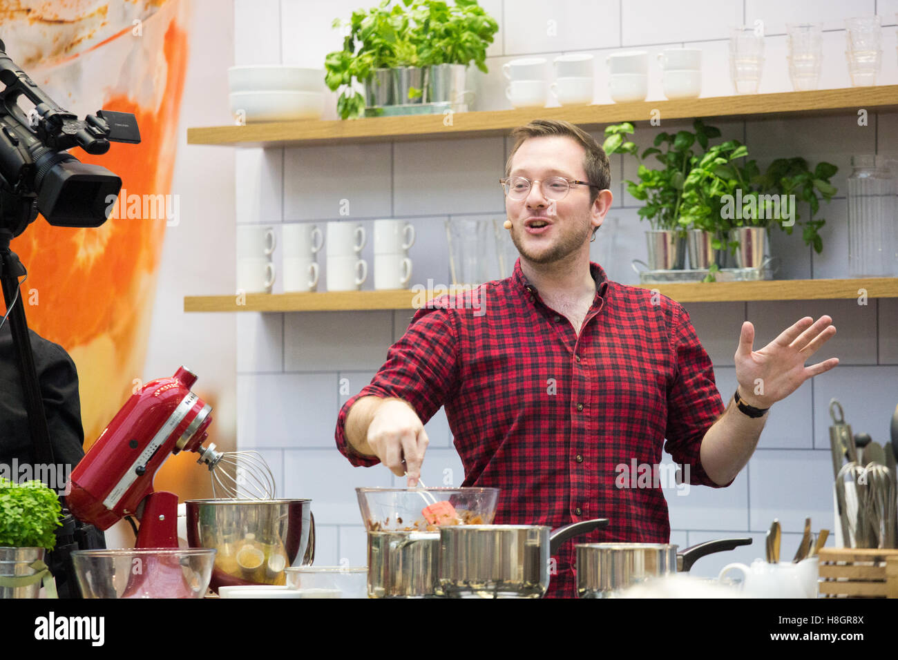 London,UK. 12th November 2016. Edd Kimber gives a cooking demo on the Good Food stage hosted by Barney Desmazery during the BBC Good Food Show. Edd is the winner of the BBC's Great British Bake Off. Credit:  Laura De Meo/ Alamy Live News Stock Photo