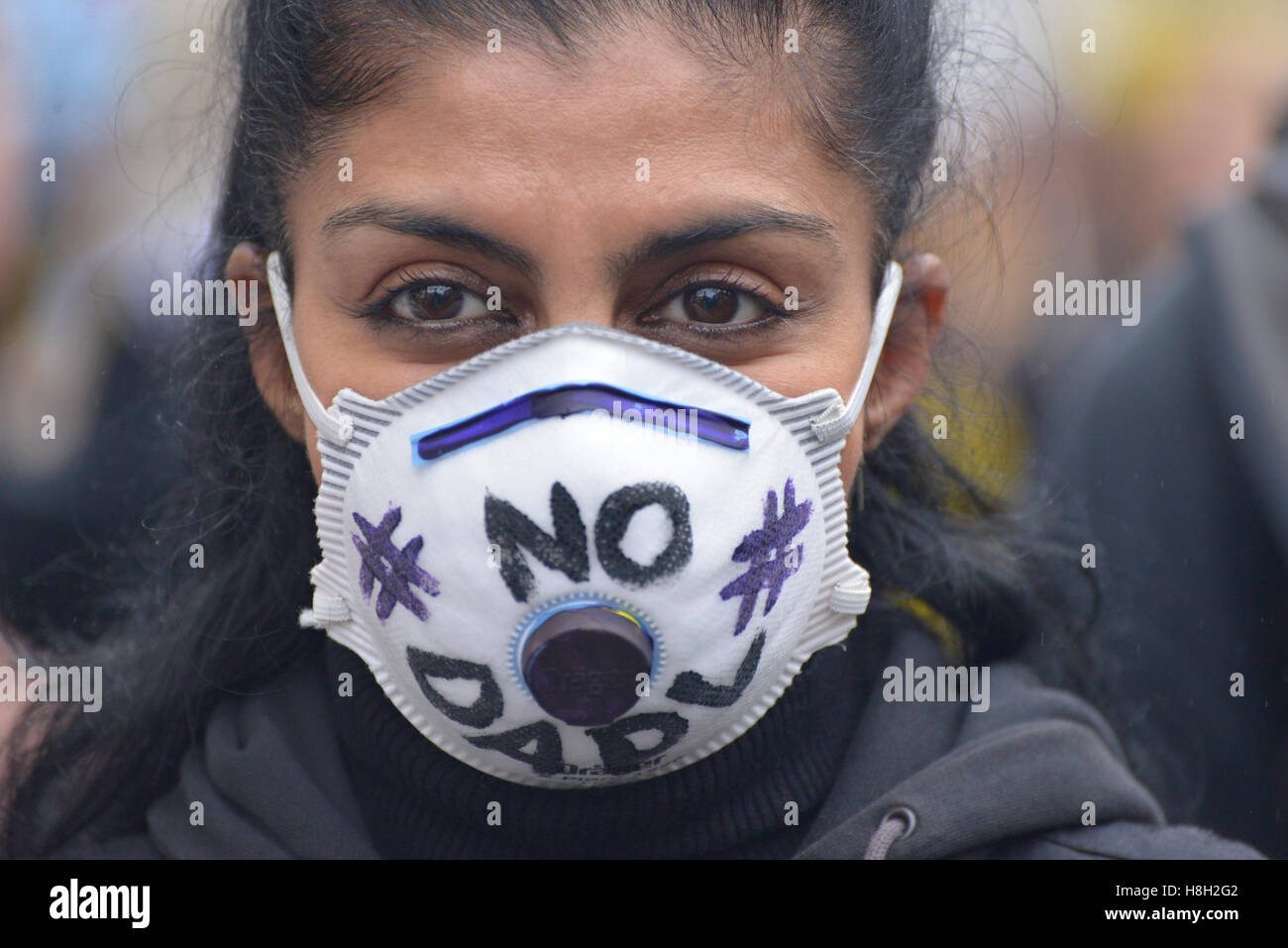 Manchester, UK. 12th Nov, 2016. A person wears a face mask to highlight the cause of 'No DAPL' - a reference to the Dakota Access Pipeline during the pre-demonstration rally against hydraulic fracturing, also known as 'fracking', on November 12, 2016 in Manchester, England. Credit:  Jonathan Nicholson/Alamy Live News Stock Photo