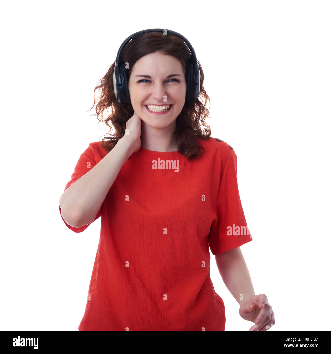 Smiling young woman over white isolated background Stock Photo - Alamy