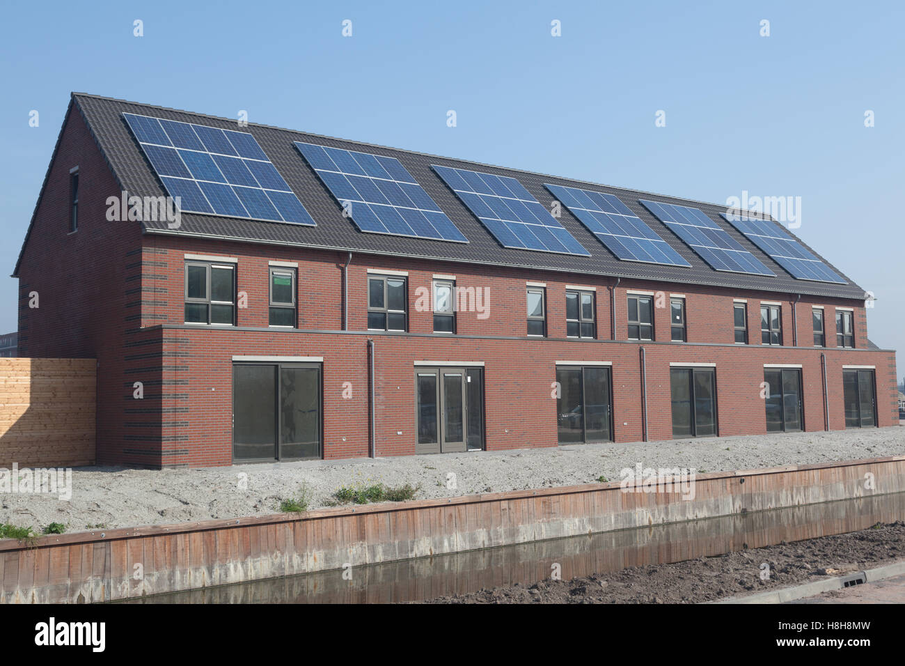 Newly built family home with solar panels on the roof Stock Photo - Alamy