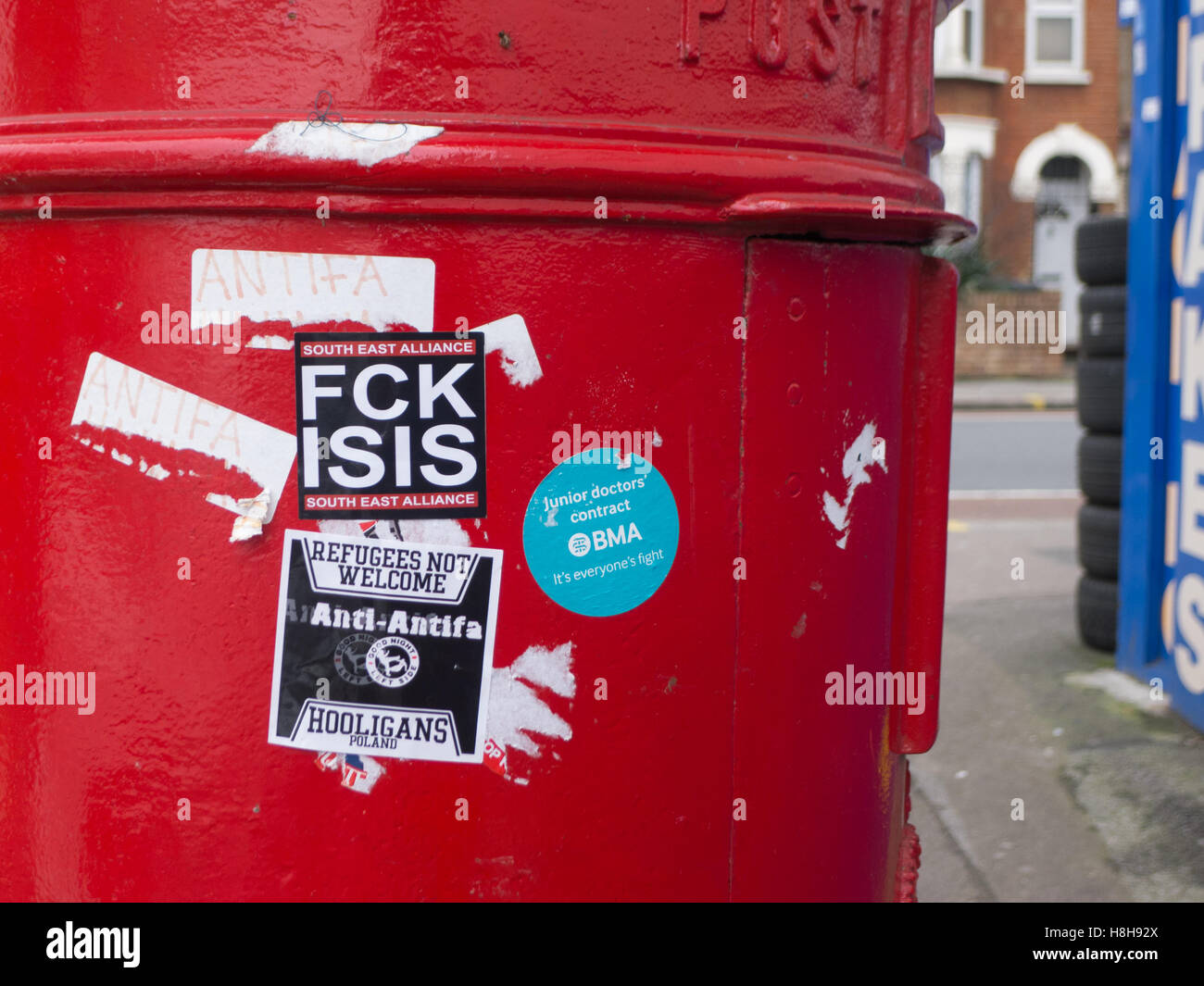 Post box and stickers Stock Photo Alamy