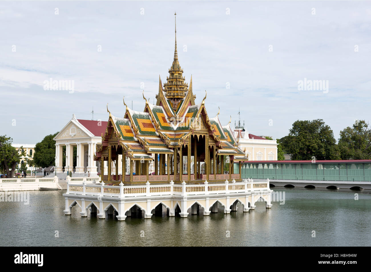 View of the Phra Thinang Aisawan Thiphya-art, a pavilion with four porches and a spired roof, at the Bang Pa-in Palace compound, Stock Photo