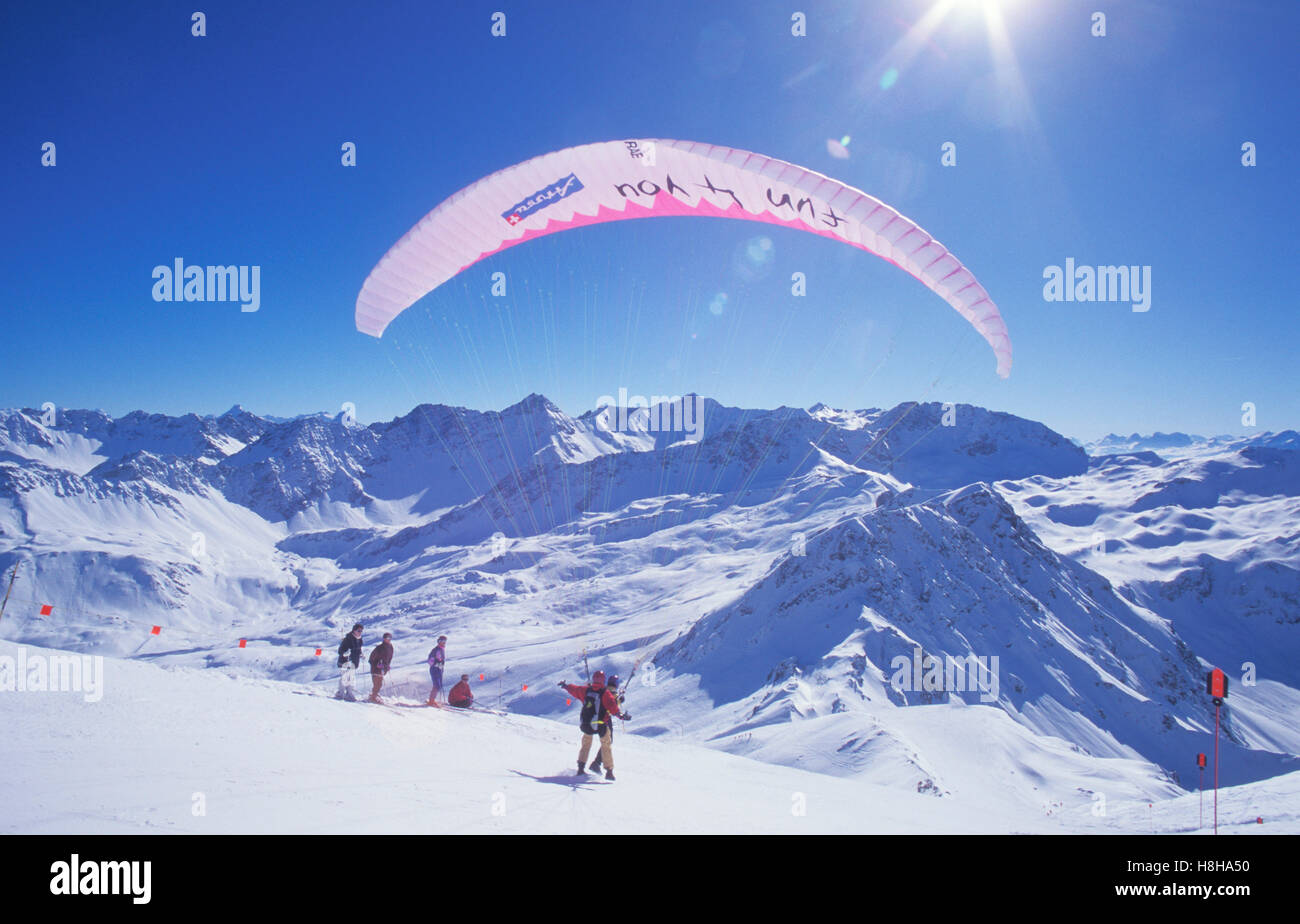 Paraglider on Mt. Weisshorn in winter, paragliding, tandem flight