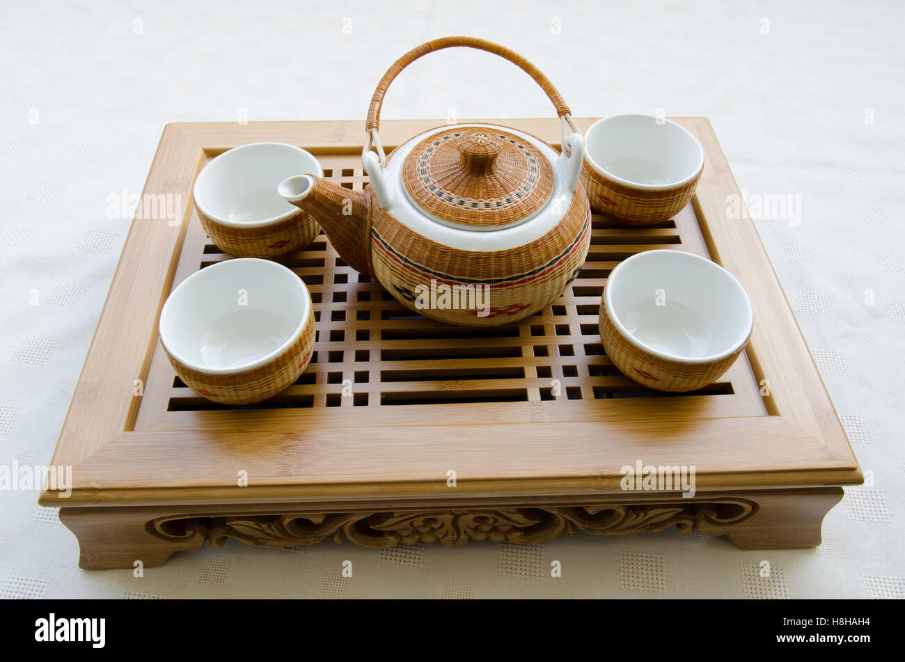 Teapot and teacup set Stock Photo