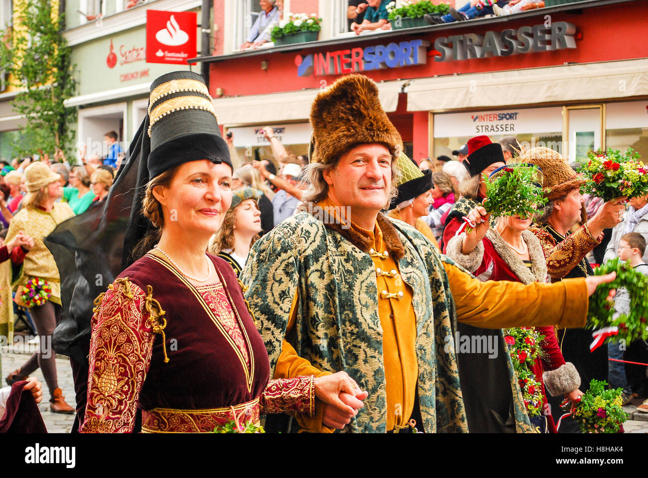 People in medieval costumes walk at the start of the parade during the Landshuter Hochzeit pageant Stock Photo