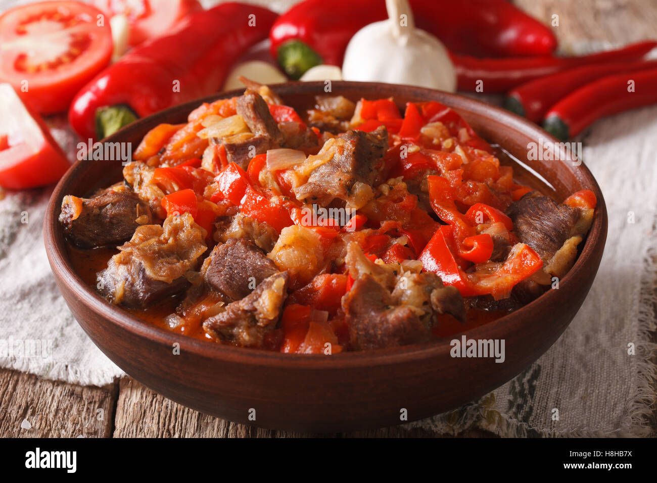 Arabic cuisine: lamb stew with vegetables close up in a bowl on the ...