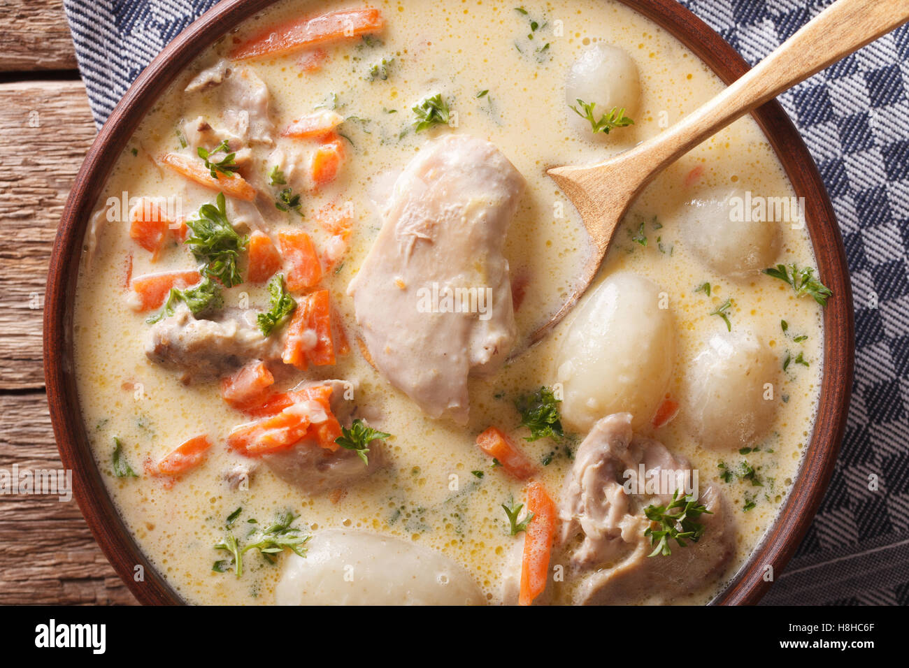 Belgian Ghent WATERZOOI soup with chicken close up in a bowl. horizontal view from above Stock Photo