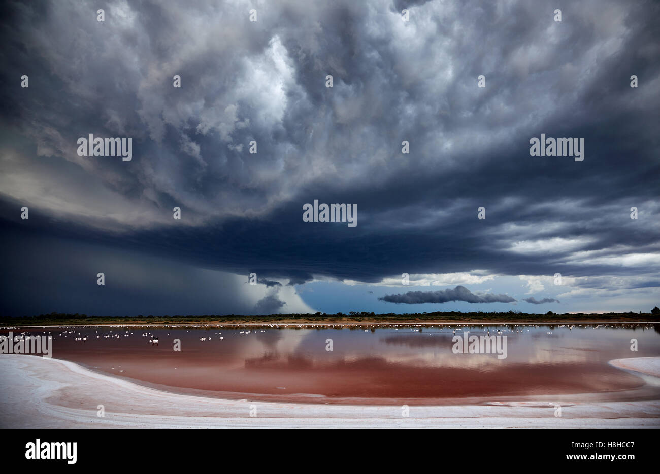 Damaging thunderstorm forming of salt lake near Mildura, Victoria, Australia. Unusual late Spring thunderstorms, increasingly violent and destructive. Stock Photo