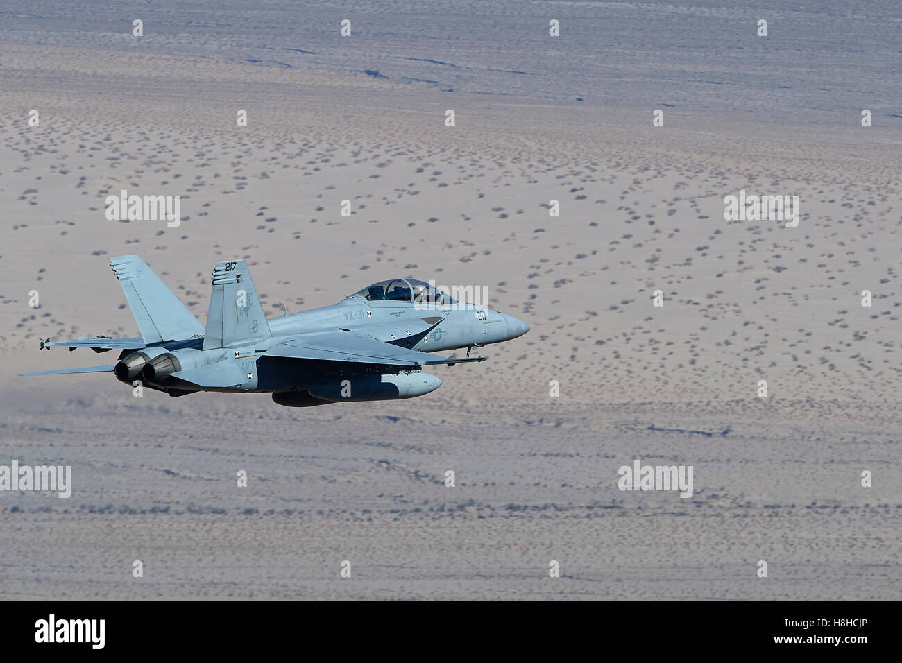 US Navy F/A-18F, Flying Over The Panamint Vallley, California. Stock Photo