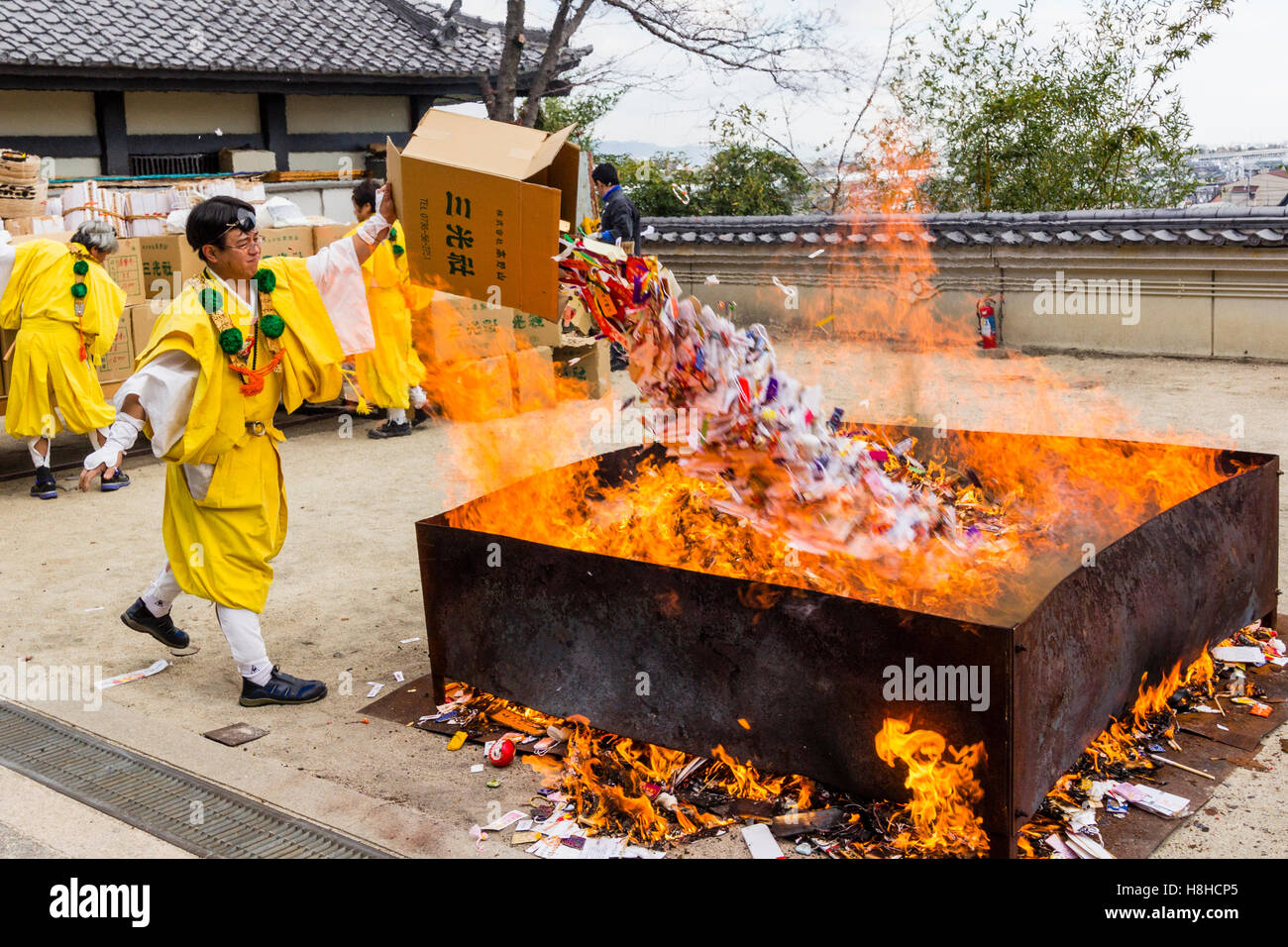 Japan, Nishinomiya, Mondo Yakujin Temple. Yamabushi priest in yellow ...