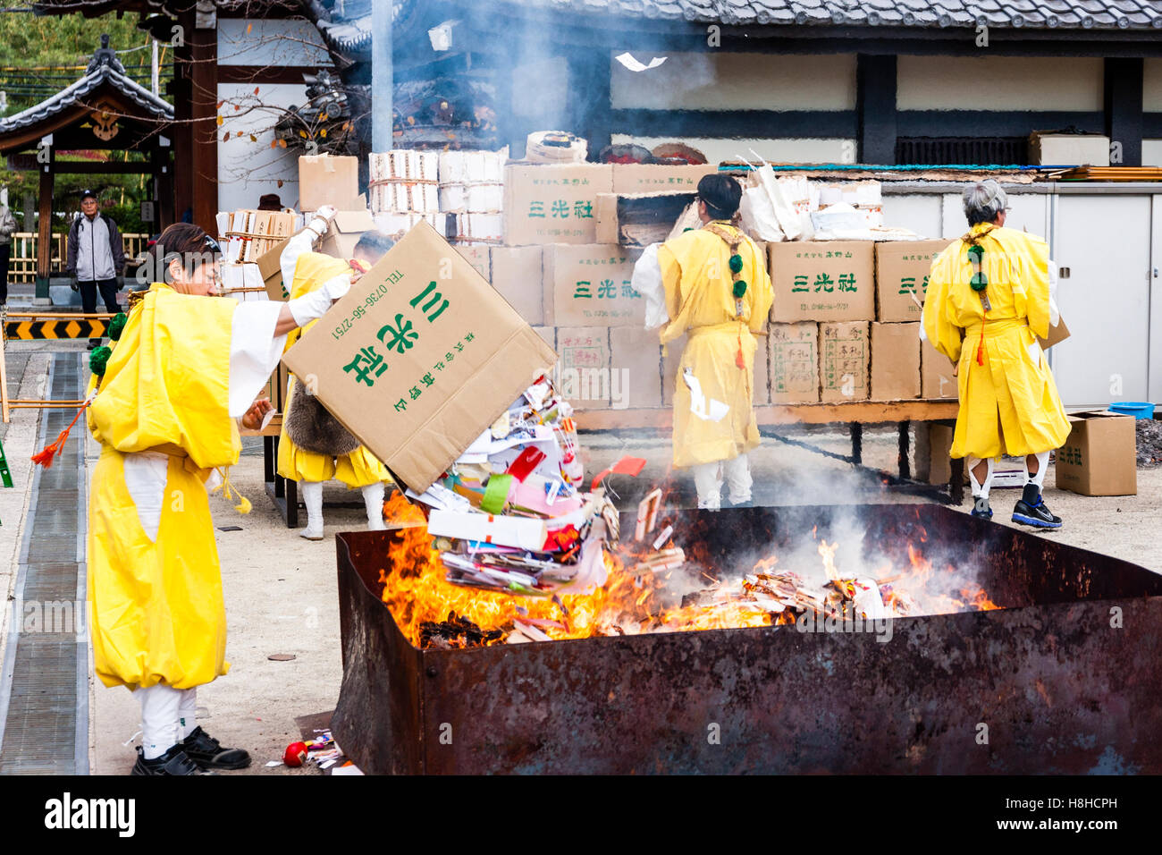 Japan, Nishinomiya, Mondo Yakujin Temple. Yamabushi priest in yellow ...