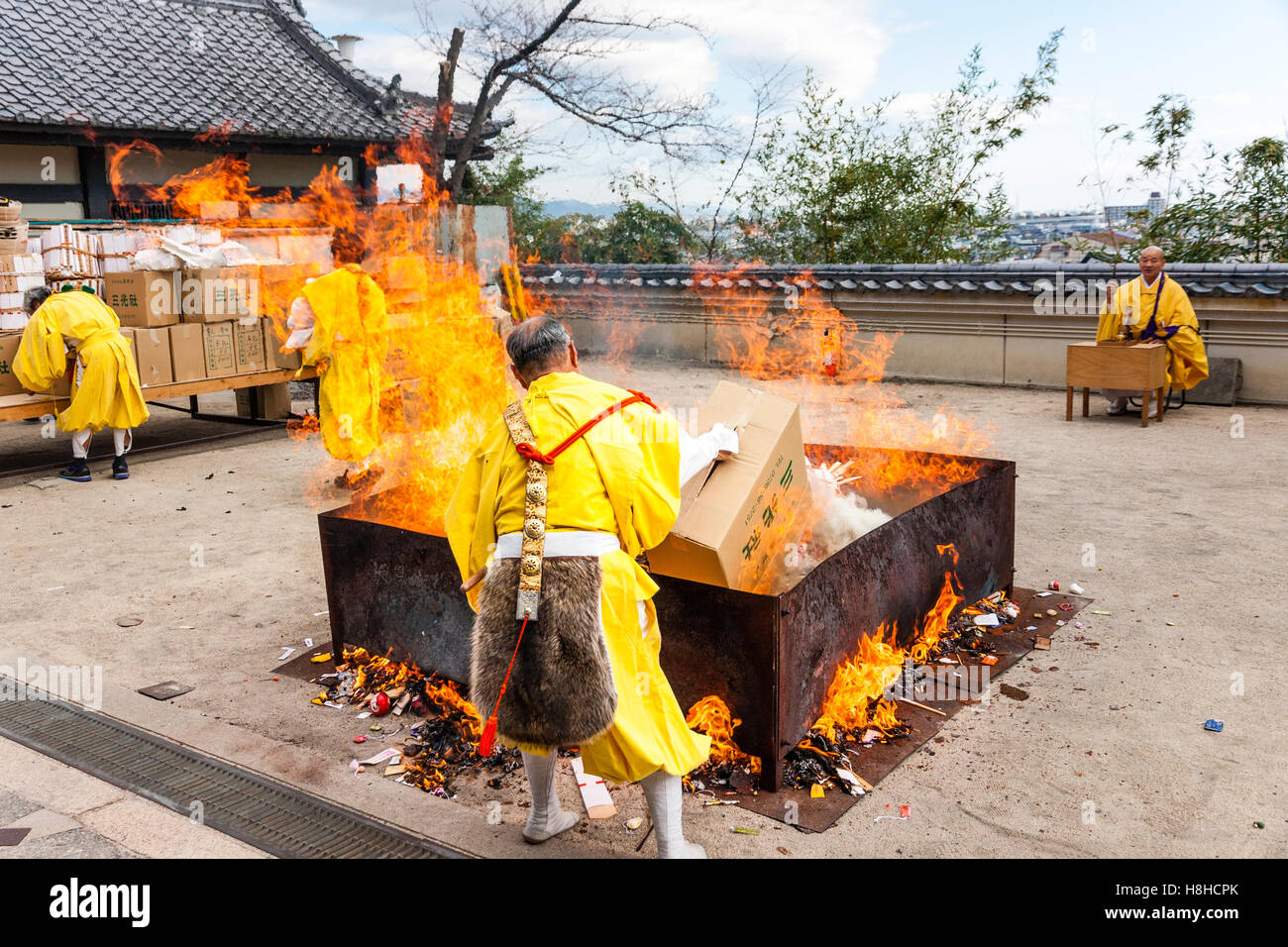 Japan, Nishinomiya, Mondo Yakujin Temple. Yamabushi priest in yellow ...