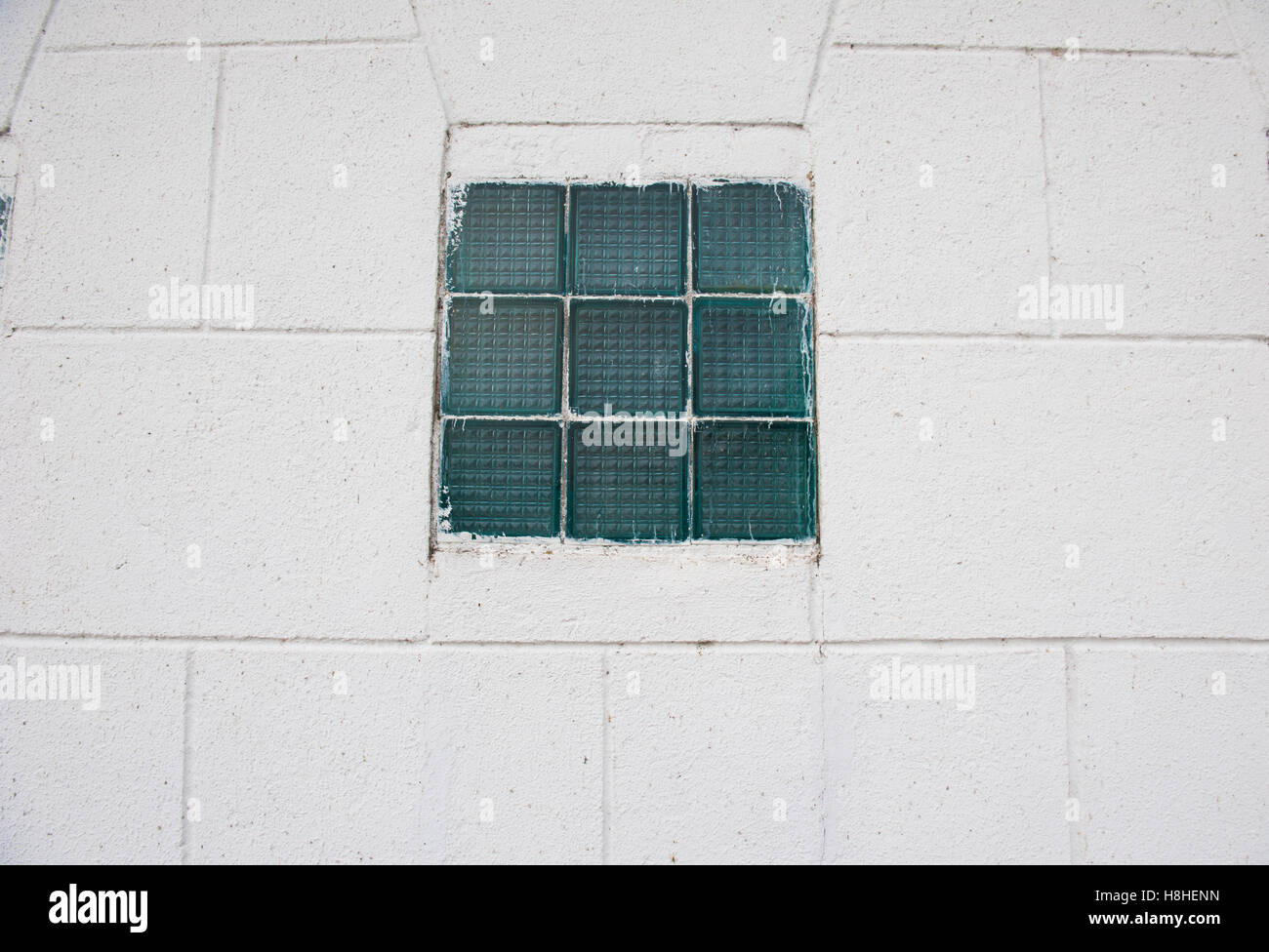 window classic on the wall. color green older window on the wall. Stock Photo