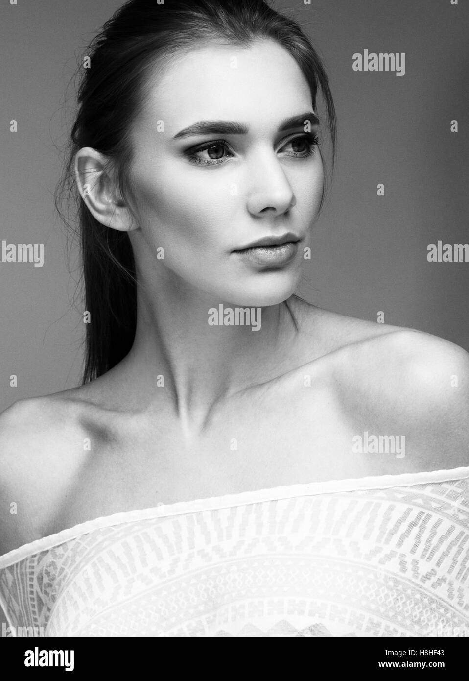 Portrait of beautiful woman girl white tshirt black and white Stock