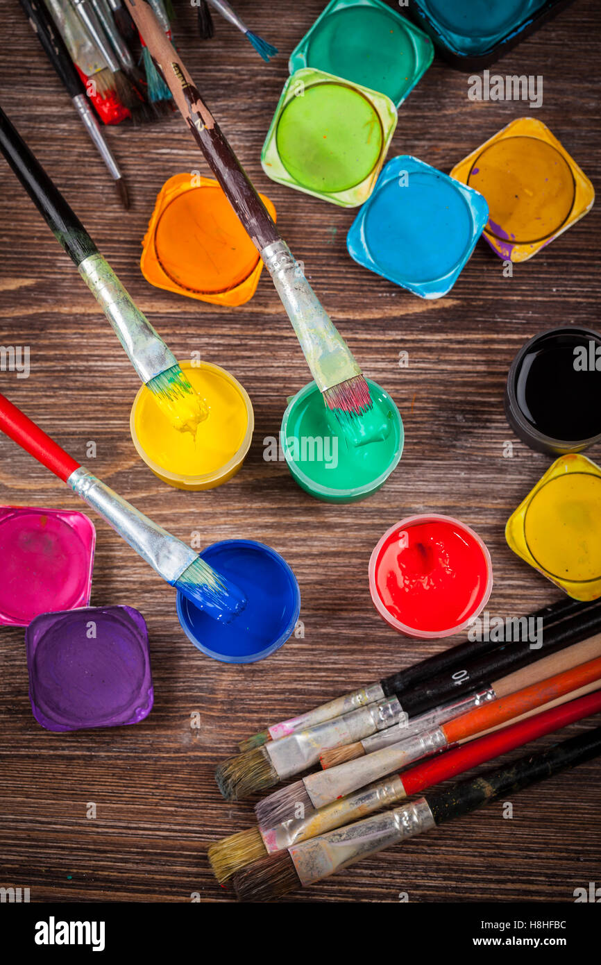 Different used brushes, colours and watercolours Stock Photo Alamy
