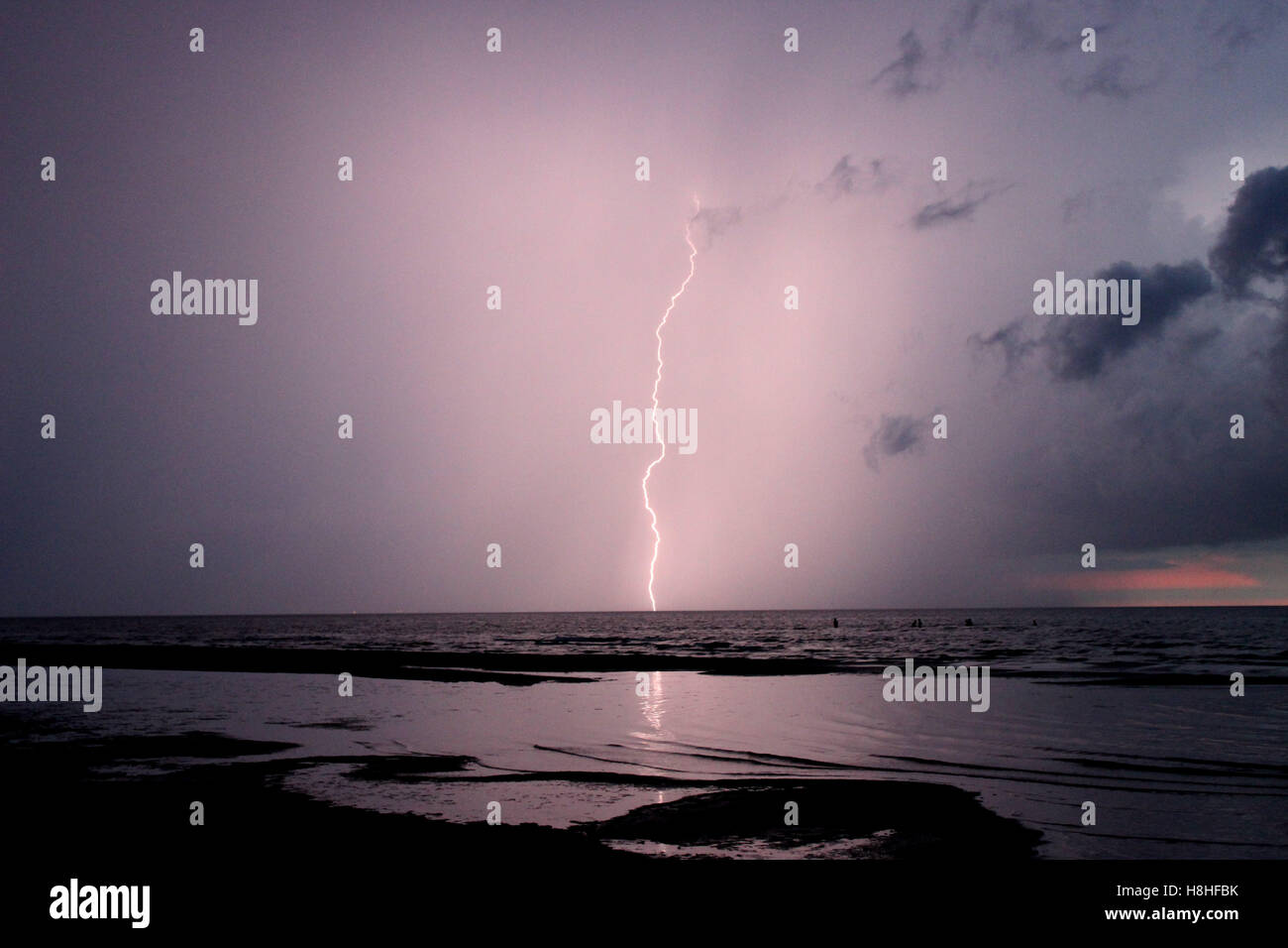Lightning captured on the Vecāķi beach. Stock Photo