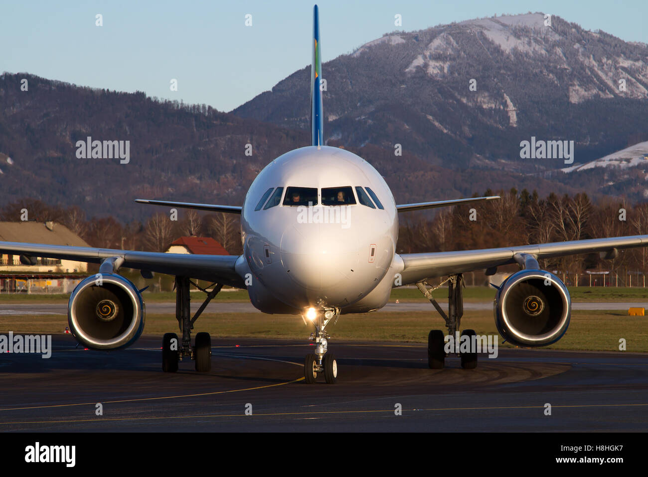 Salzburg/Austria August 9, 2016: Airbus from Small planet landing at Salzburg Airport. Stock Photo
