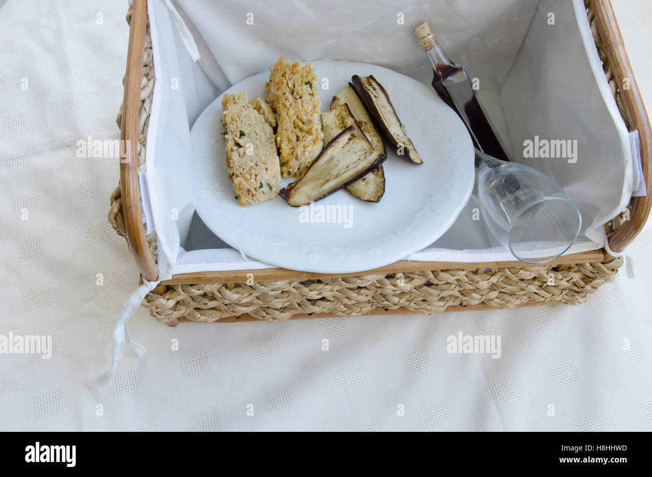 picnic basket with food and wine glasses Stock Photo Alamy