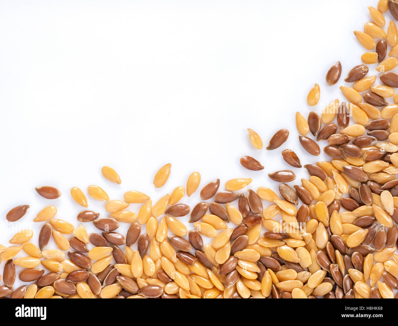Golden and brown flax seed Stock Photo Alamy