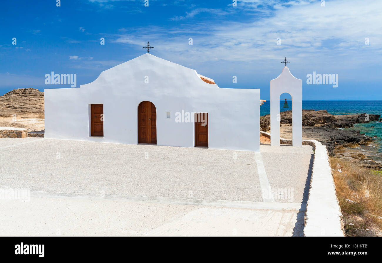 Agios Nikolaos. White Orthodox church on the Ionic Sea coast. Zakynthos island, Greece Stock Photo