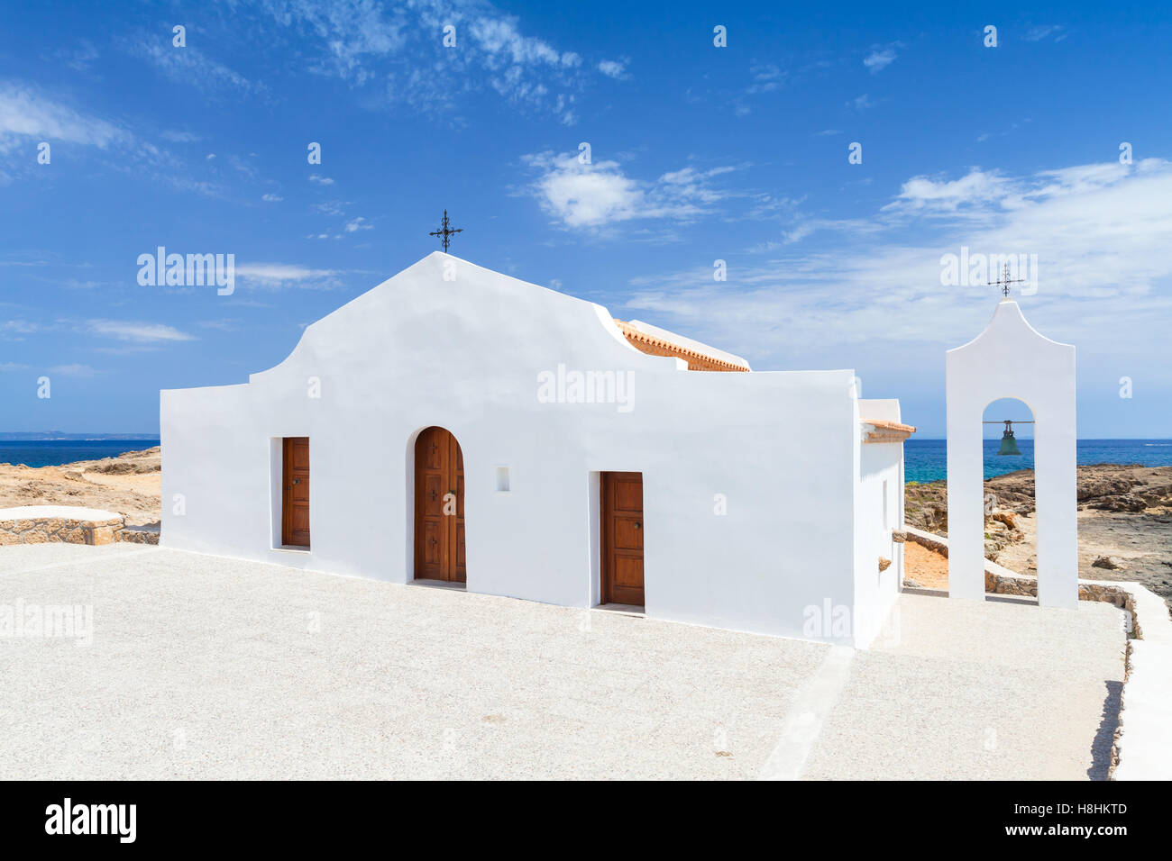 Agios Nikolaos. White Orthodox church on the Ionic Sea coast. Zakynthos, Greece Stock Photo