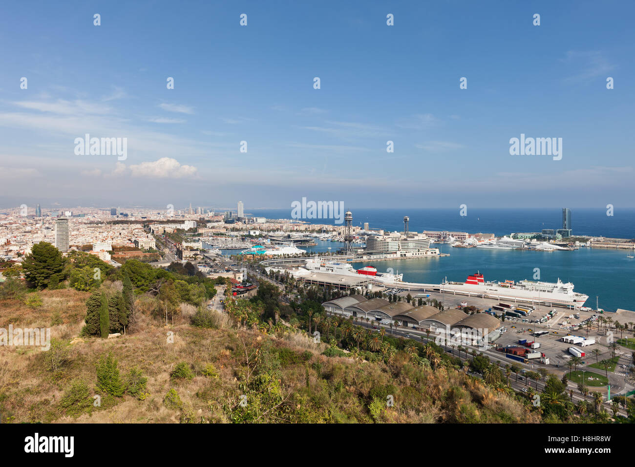Spain, Barcelona, view over the city and port from Montjuic Hill, seaside cityscape Stock Photo