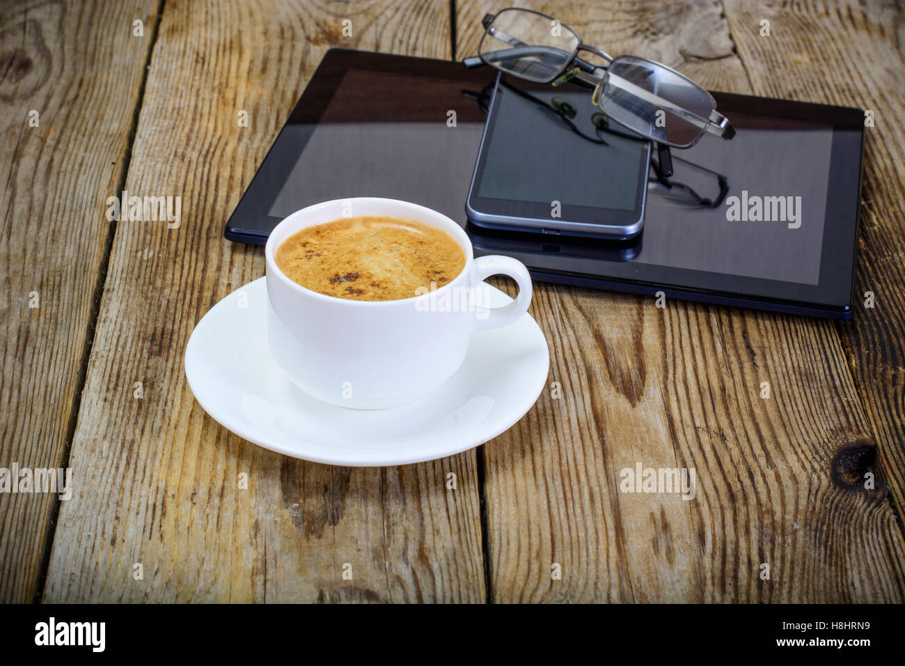 Workplace Businessman: Laptop, Coffee, Mobile Phone And Sunglass Stock 