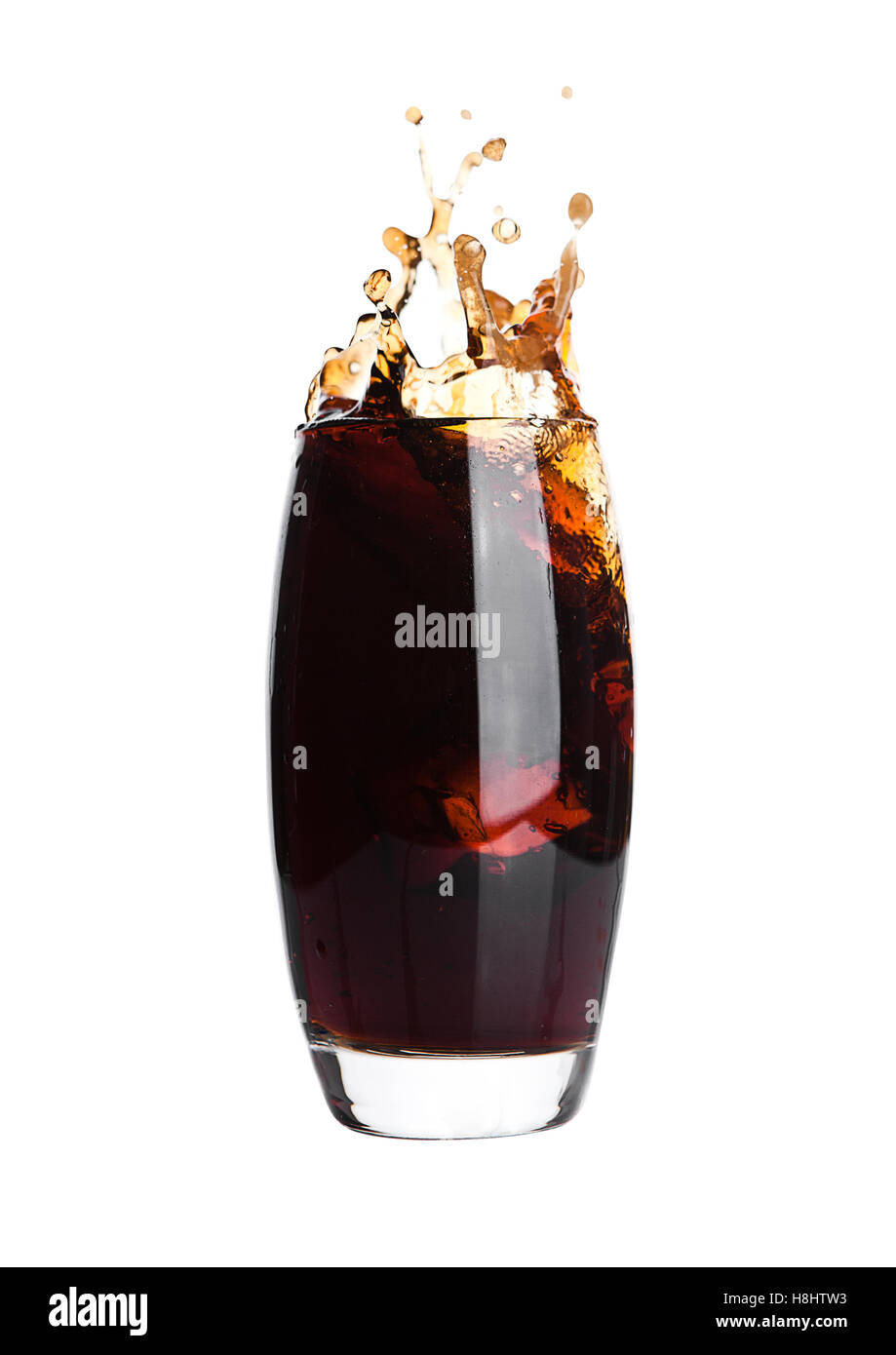 Glass of cola with splash and ice cubes on white background Stock Photo ...