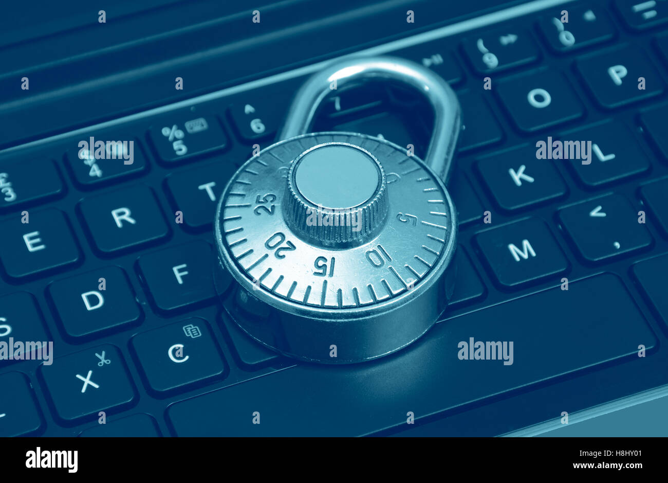 Computer security concept with a closed padlock on the keyboard. Stock Photo