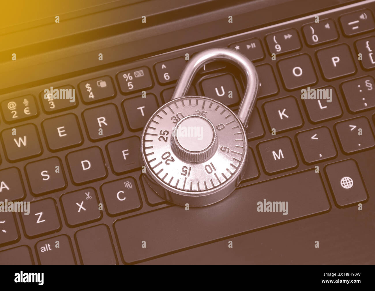 Computer security concept with a closed padlock on the keyboard. Stock Photo